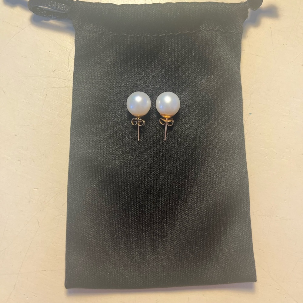 Pearl Earrings with gold backings, worn twice. Excellent condition.
